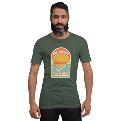 One Sunrise at a Time retro sunrise tee — Heather Forest, on model