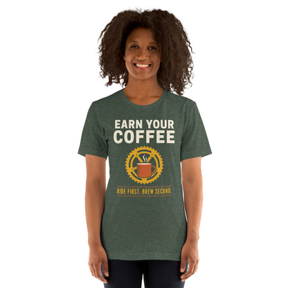 Earn Your Coffee retro cycling coffee t-shirt — Heather Forest, on model