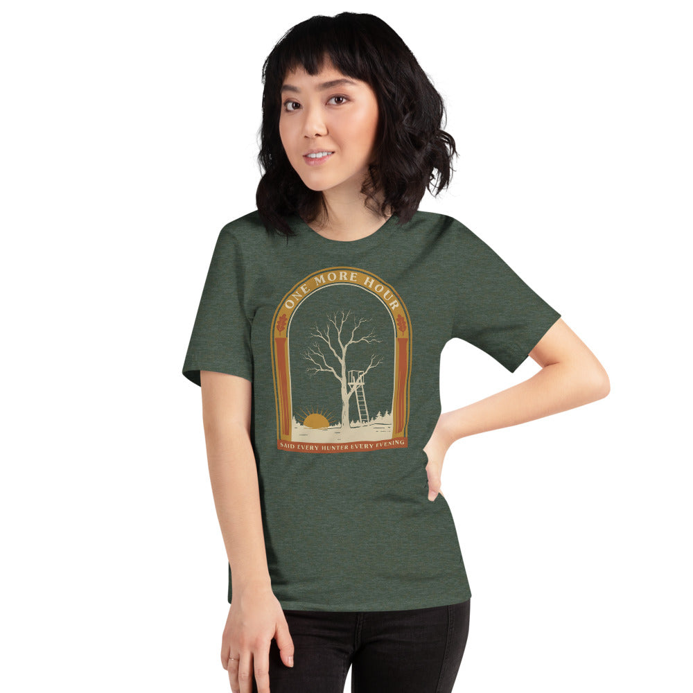 One More Hour funny deer hunting tee — Heather Forest, on model