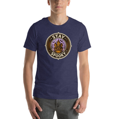 Stay Spooky retro Halloween vintage badge tee — Heather Midnight Navy, on model