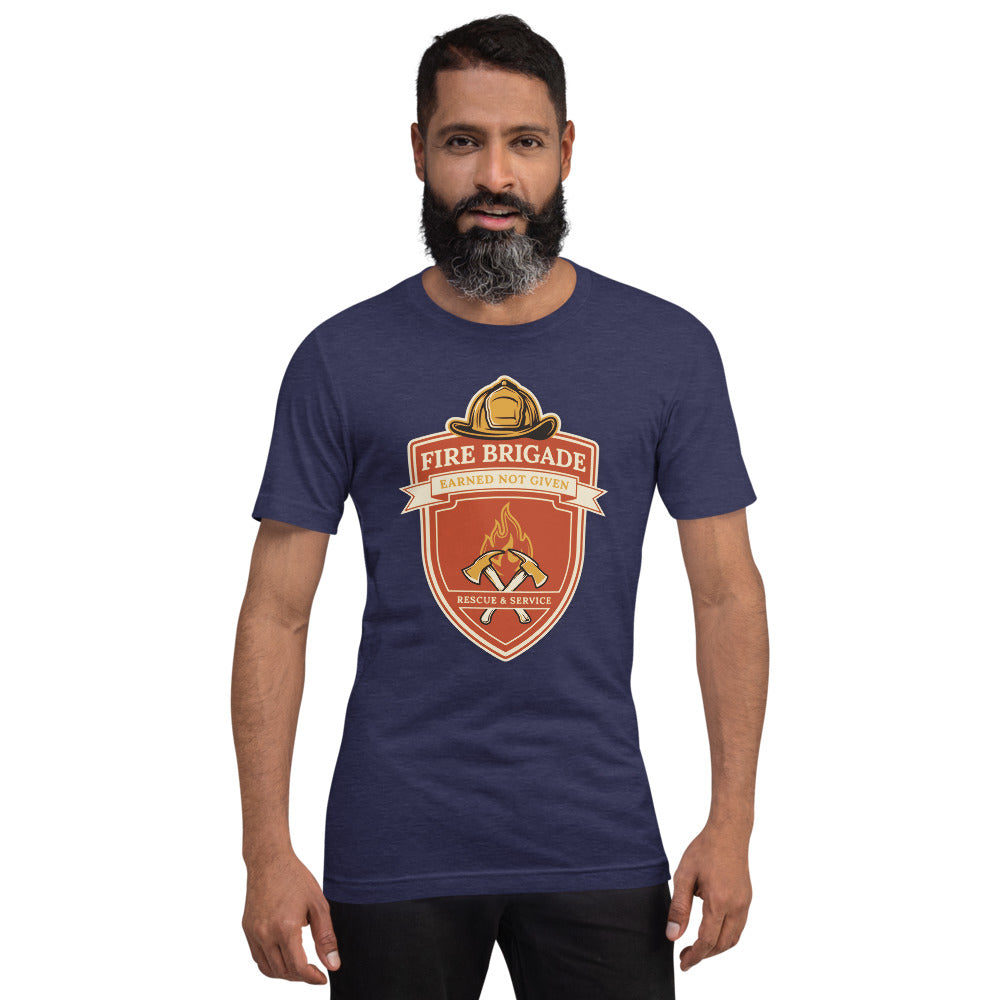 Fire Brigade Earned Not Given retro firefighter shield emblem tee — Heather Midnight Navy, on model