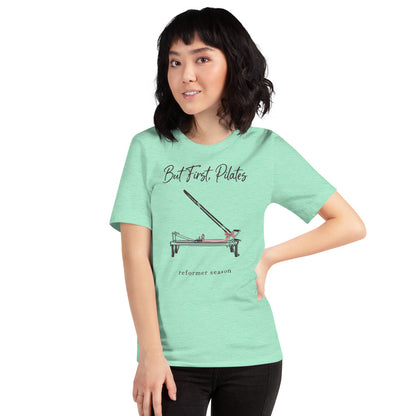 But First Pilates reformer line-art tee — Heather Mint, on model