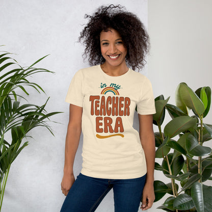 In My Teacher Era retro groovy teacher tee — Heather Natural, on model