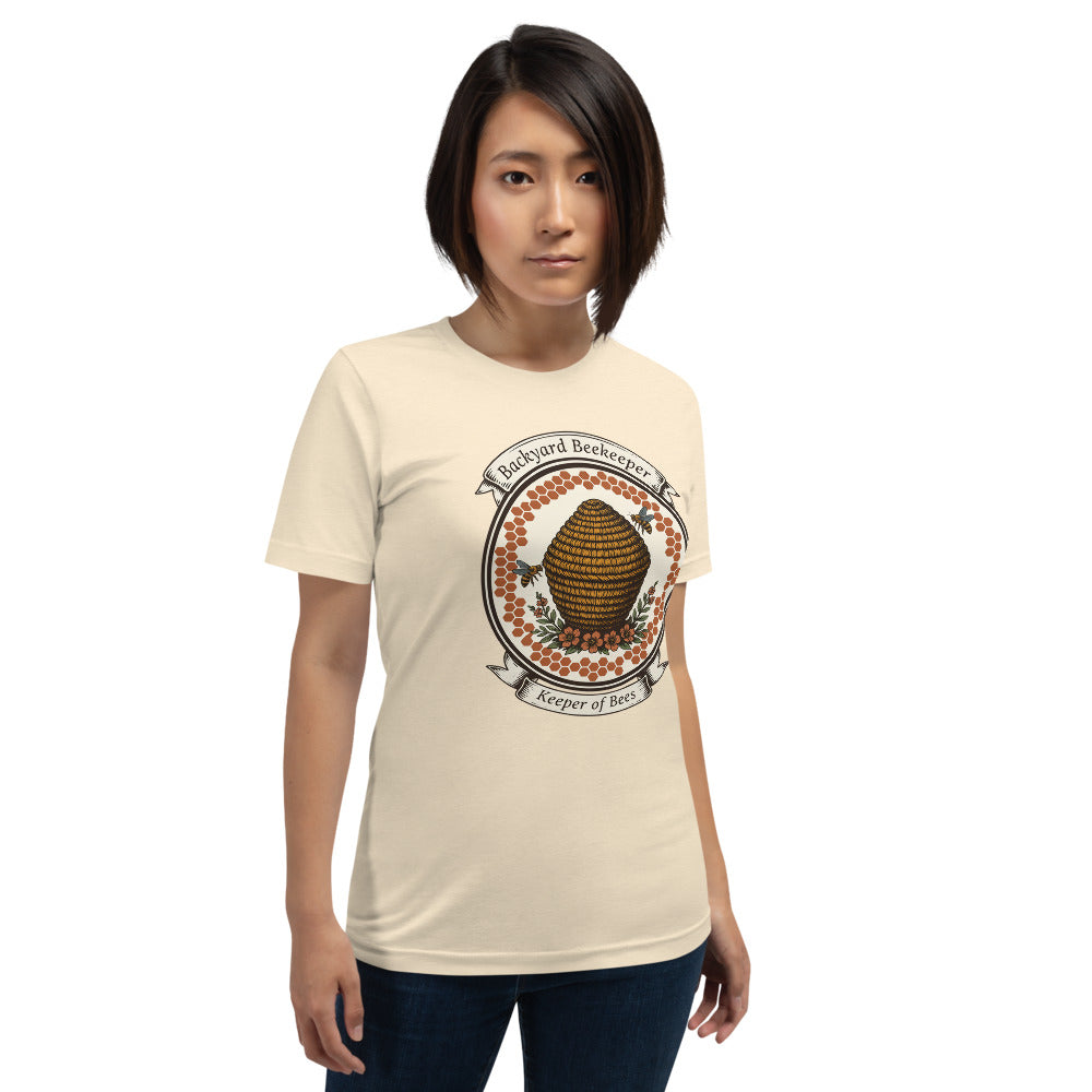 Backyard Beekeeper Keeper of Bees vintage apiary crest tee — Heather Natural, on model