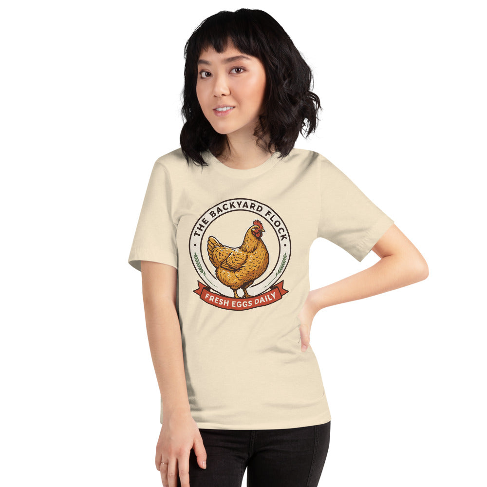 Backyard Flock heritage chicken keeper tee — Heather Natural, on model