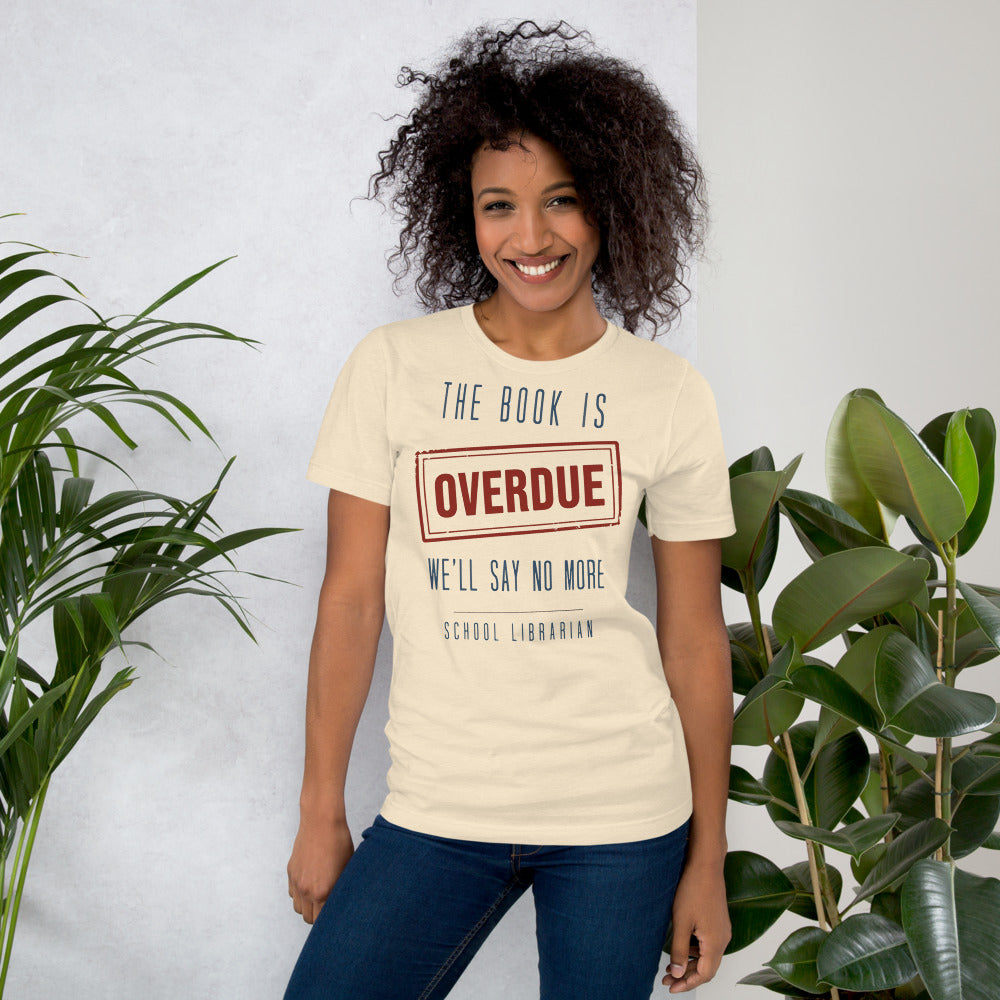 The Book Is Overdue funny school librarian t-shirt — Heather Natural, on model