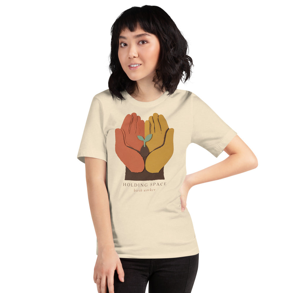 Holding Space birth worker doula t-shirt — Heather Natural, on model