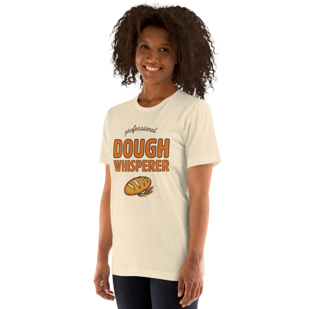 Professional Dough Whisperer funny baker tee — Heather Natural, on model