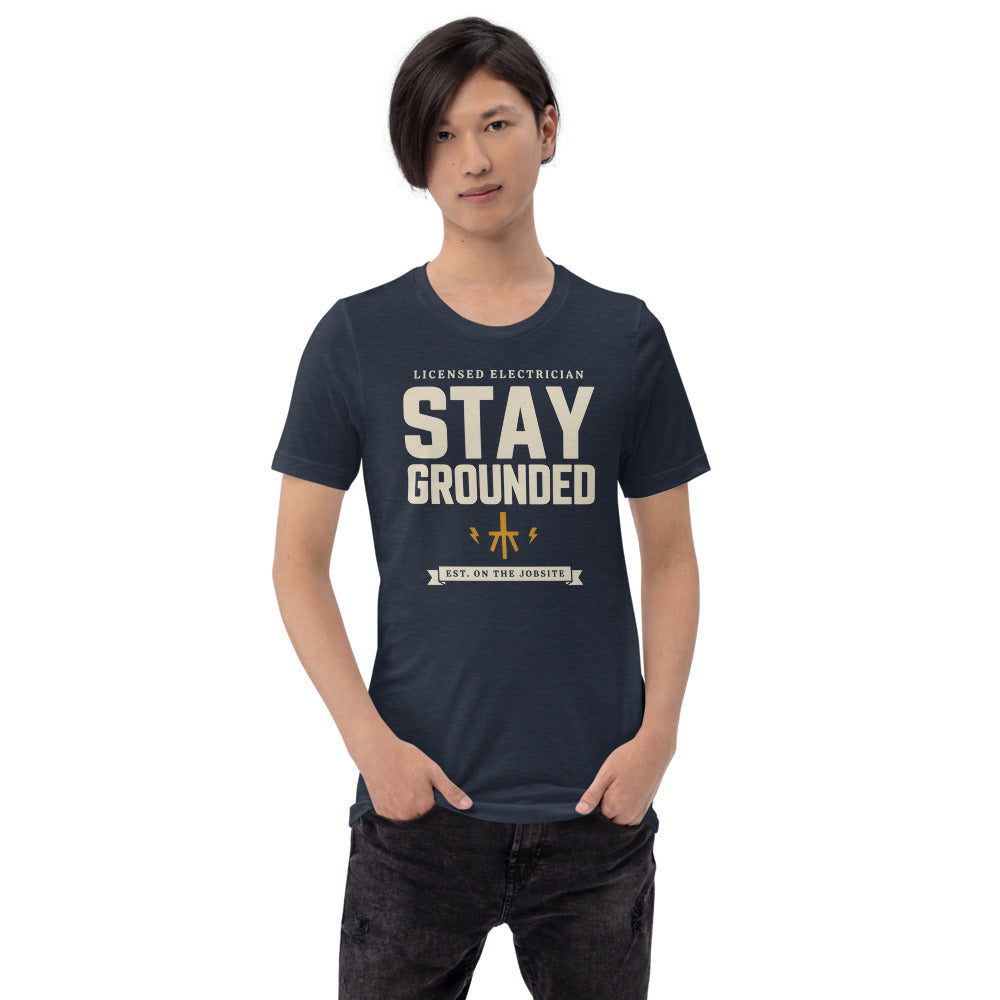 Stay Grounded funny electrician tee — Heather Navy, on model