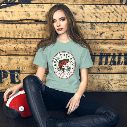 Reel Therapy retro national-park trout badge fishing tee — Heather Prism Dusty Blue, on model