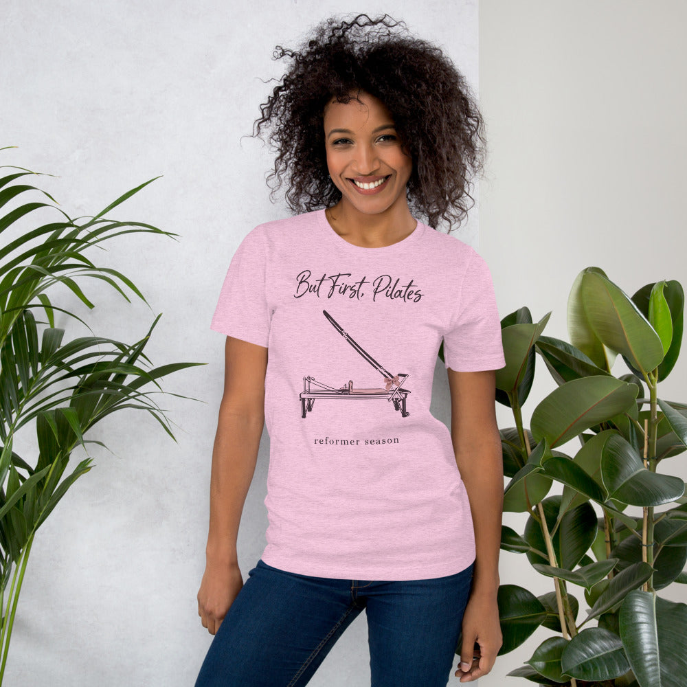 But First Pilates reformer line-art tee — Heather Prism Lilac, on model