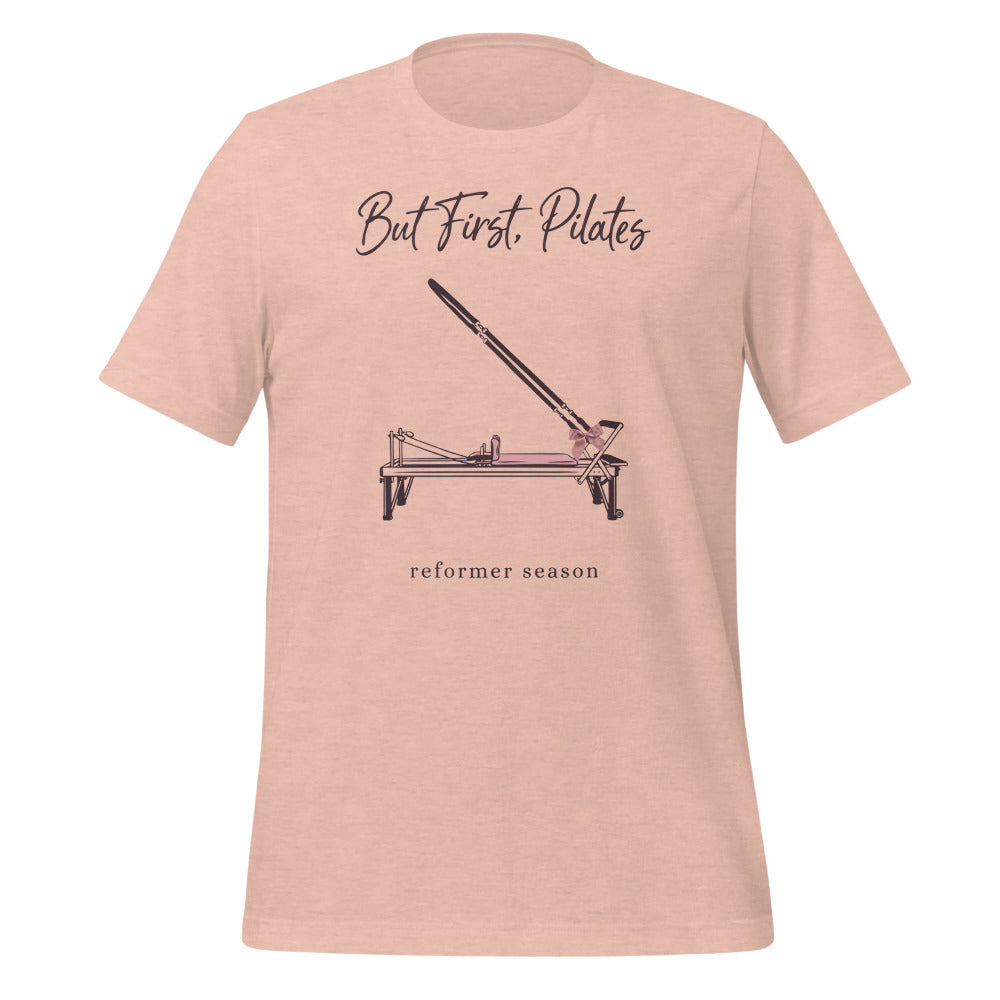 But First Pilates reformer line-art tee — Heather Prism Peach, front