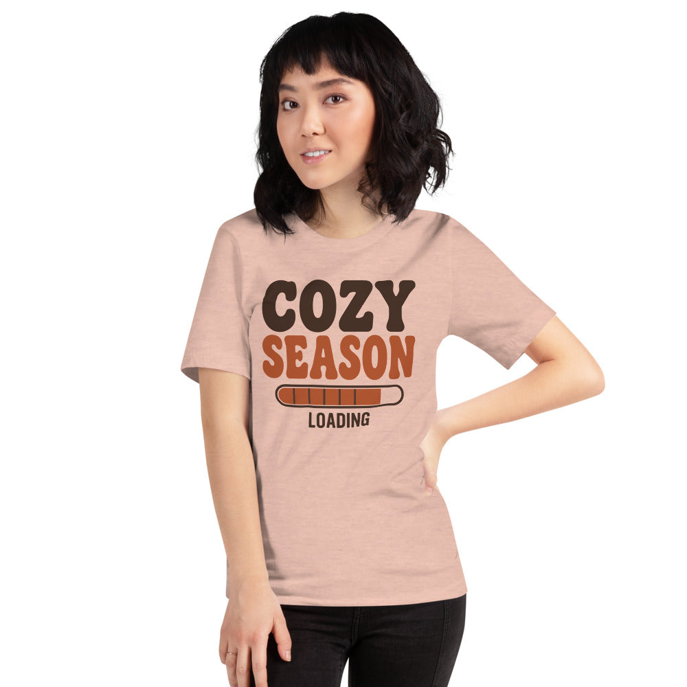 Cozy Season Loading retro 70s fall t-shirt — Heather Prism Peach, on model