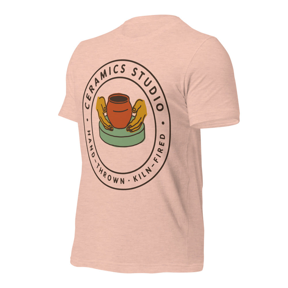 Ceramics Studio Badge hand-thrown pottery t-shirt — Heather Prism Peach, front-right