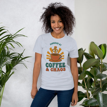 Powered By Coffee And Chaos retro groovy teacher tee — Light Blue, on model