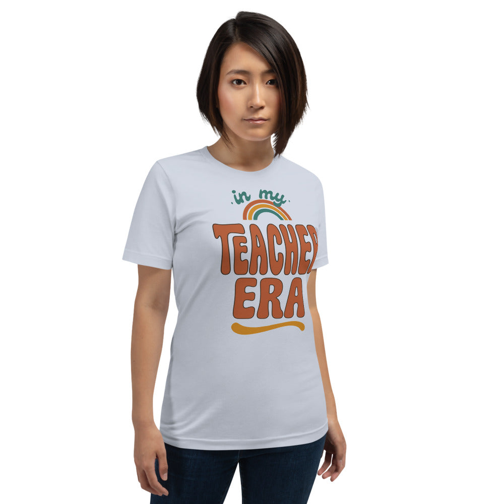 In My Teacher Era retro groovy teacher tee — Light Blue, on model