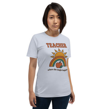 Teacher Where The Magic Happens retro groovy teacher tee — Light Blue, on model
