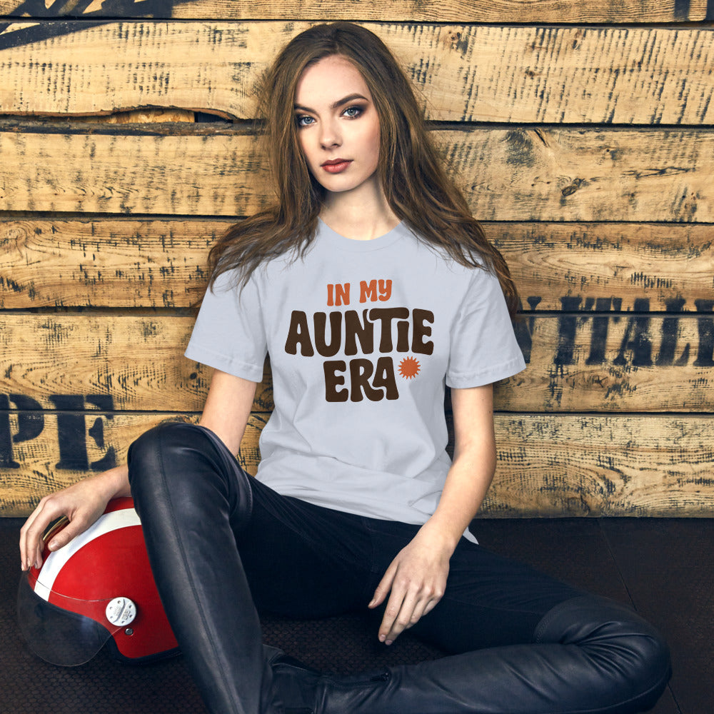 In My Auntie Era retro groovy aunt tee — Light Blue, on model