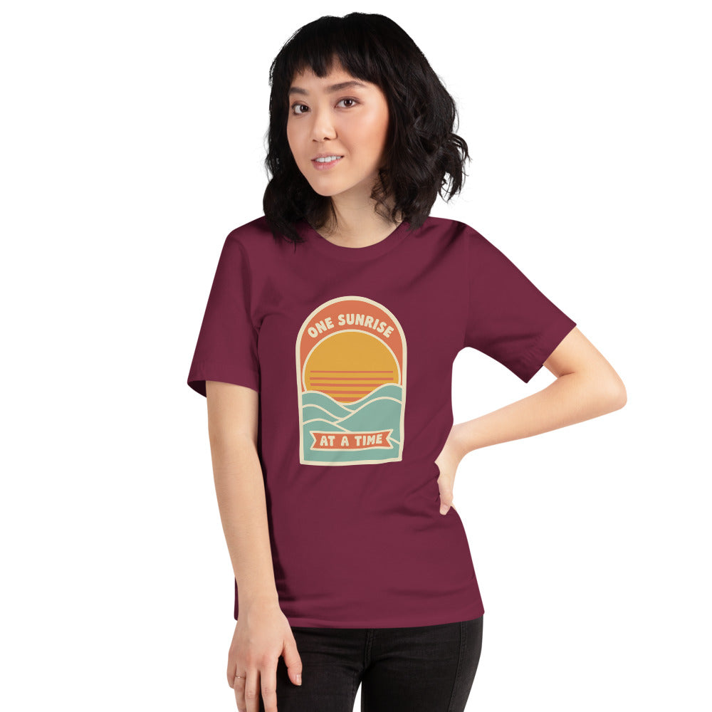 One Sunrise at a Time retro sunrise tee — Maroon, on model