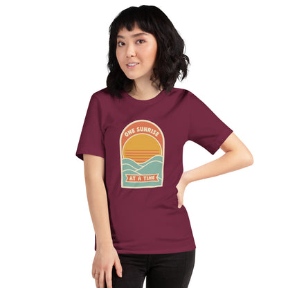 One Sunrise at a Time retro sunrise tee — Maroon, on model