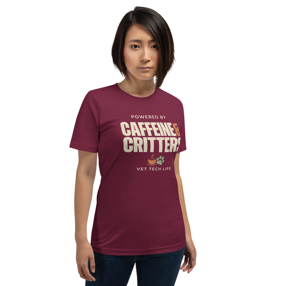 Powered by Caffeine & Critters funny vet tech tee — Maroon, on model