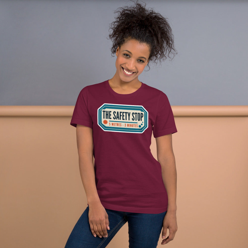 The Safety Stop vintage scuba diving travel decal t-shirt — Maroon, on model