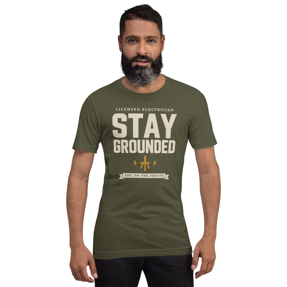 Stay Grounded funny electrician tee — Military Green, on model