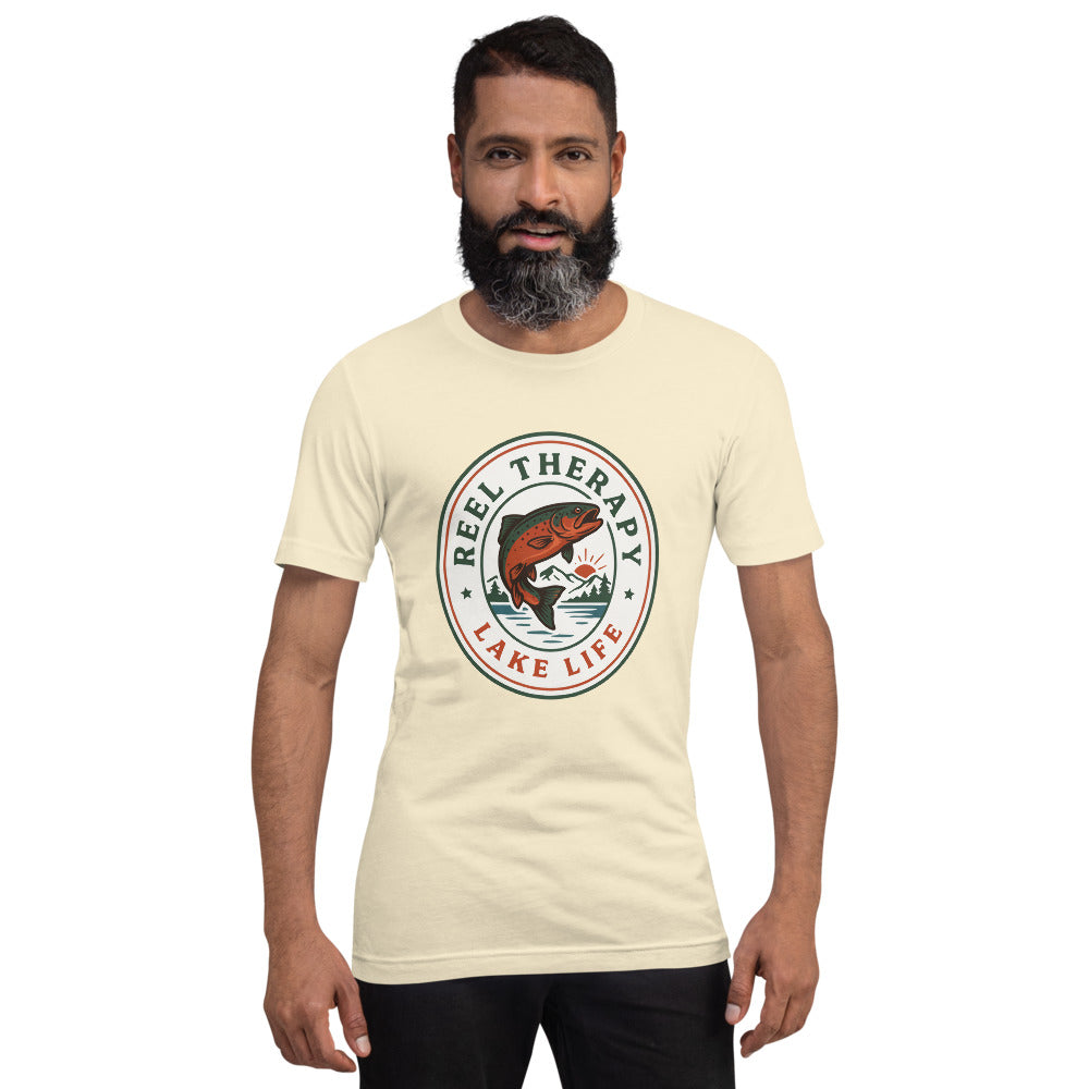 Reel Therapy retro national-park trout badge fishing tee — Natural, on model