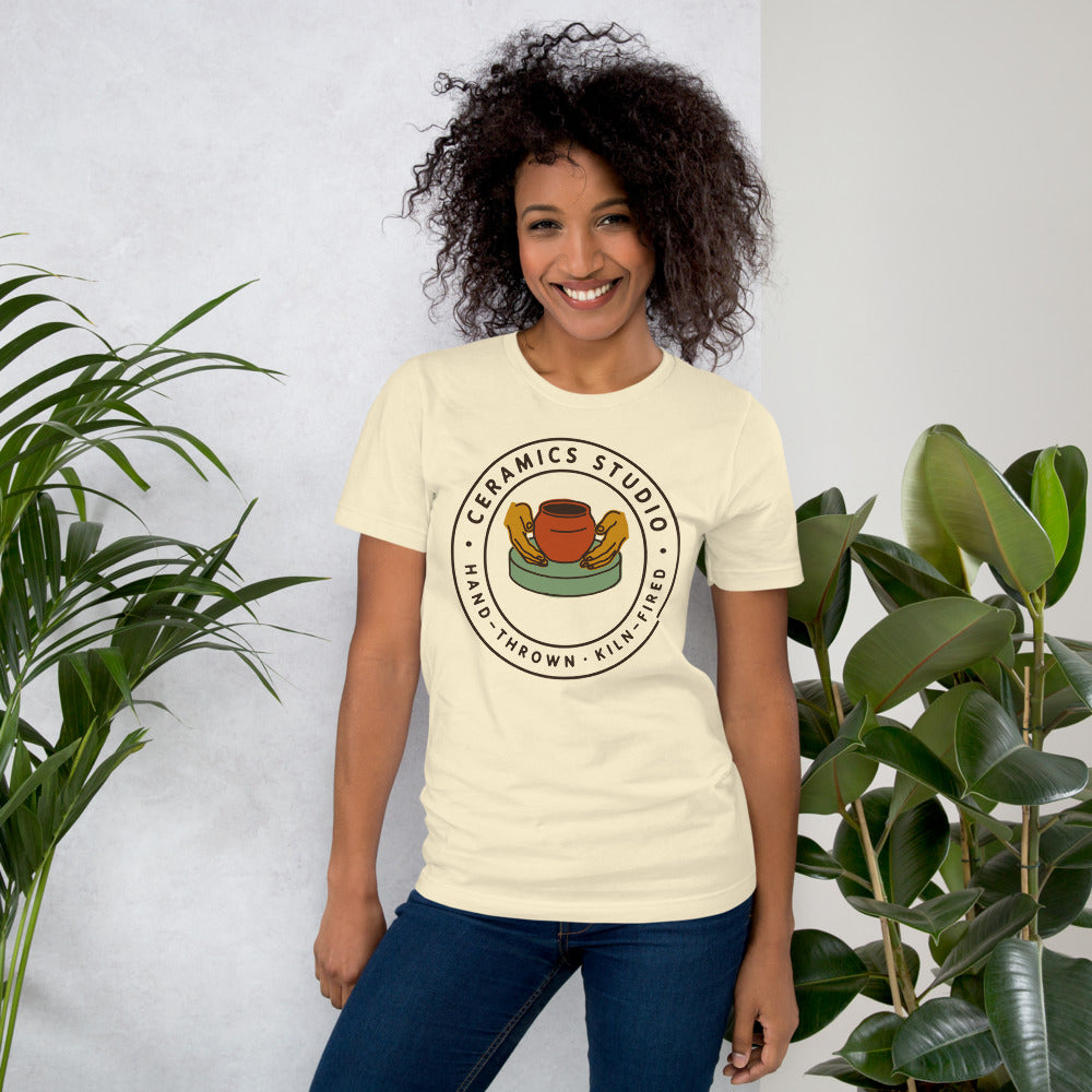 Ceramics Studio Badge hand-thrown pottery t-shirt — Natural, on model