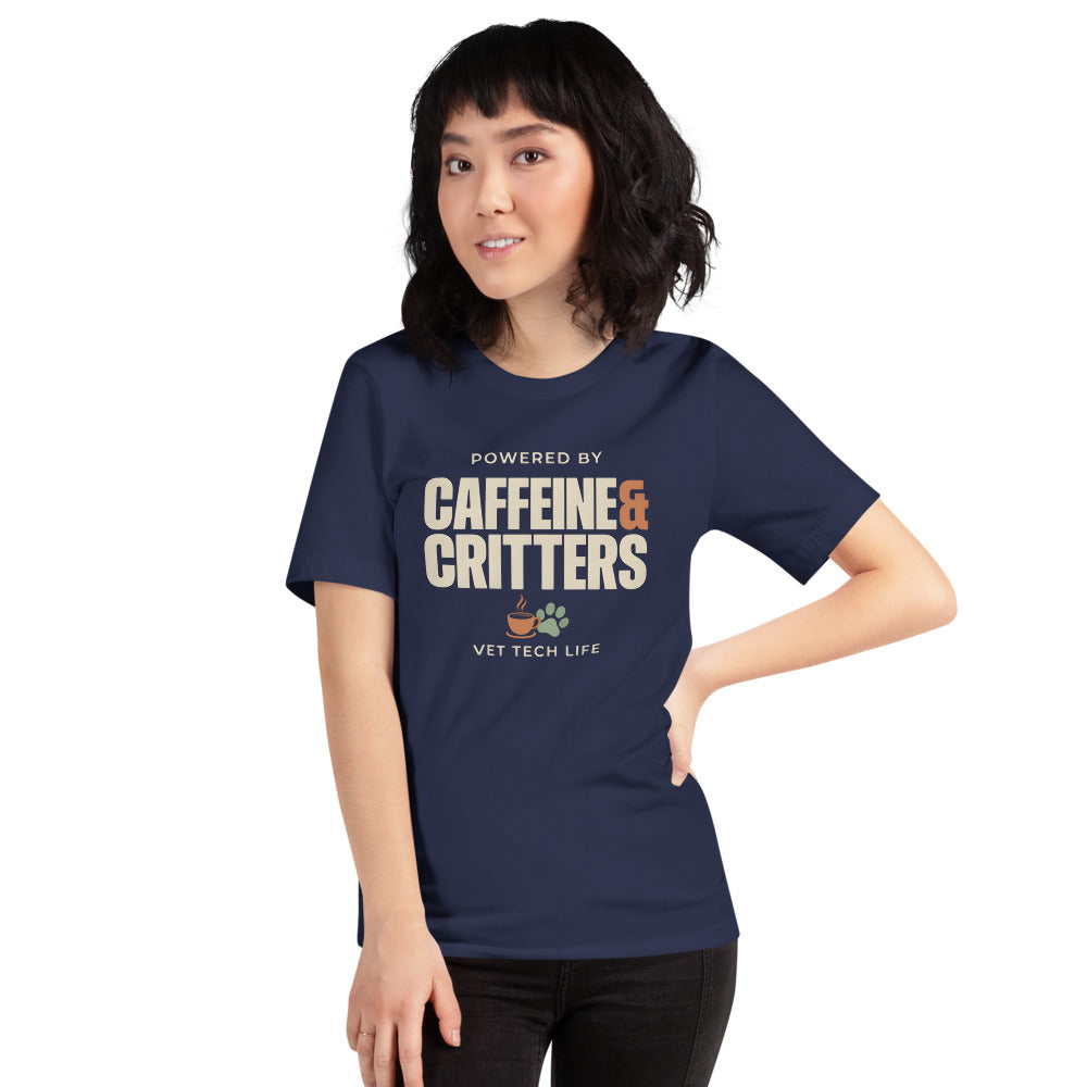 Powered by Caffeine & Critters funny vet tech tee — Navy, on model