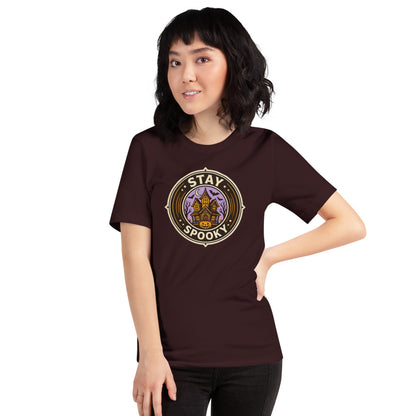 Stay Spooky retro Halloween vintage badge tee — Oxblood Black, on model