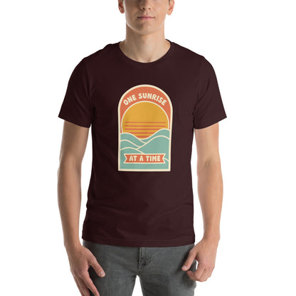 One Sunrise at a Time retro sunrise tee — Oxblood Black, on model