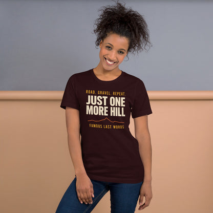 Just One More Hill retro cycling climb t-shirt — Oxblood Black, on model