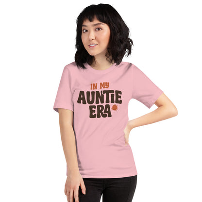 In My Auntie Era retro groovy aunt tee — Pink, on model