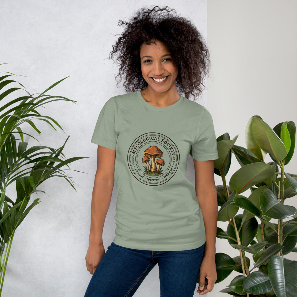 Mushroom Foraging Mycological Society vintage botanical tee — Sage, on model