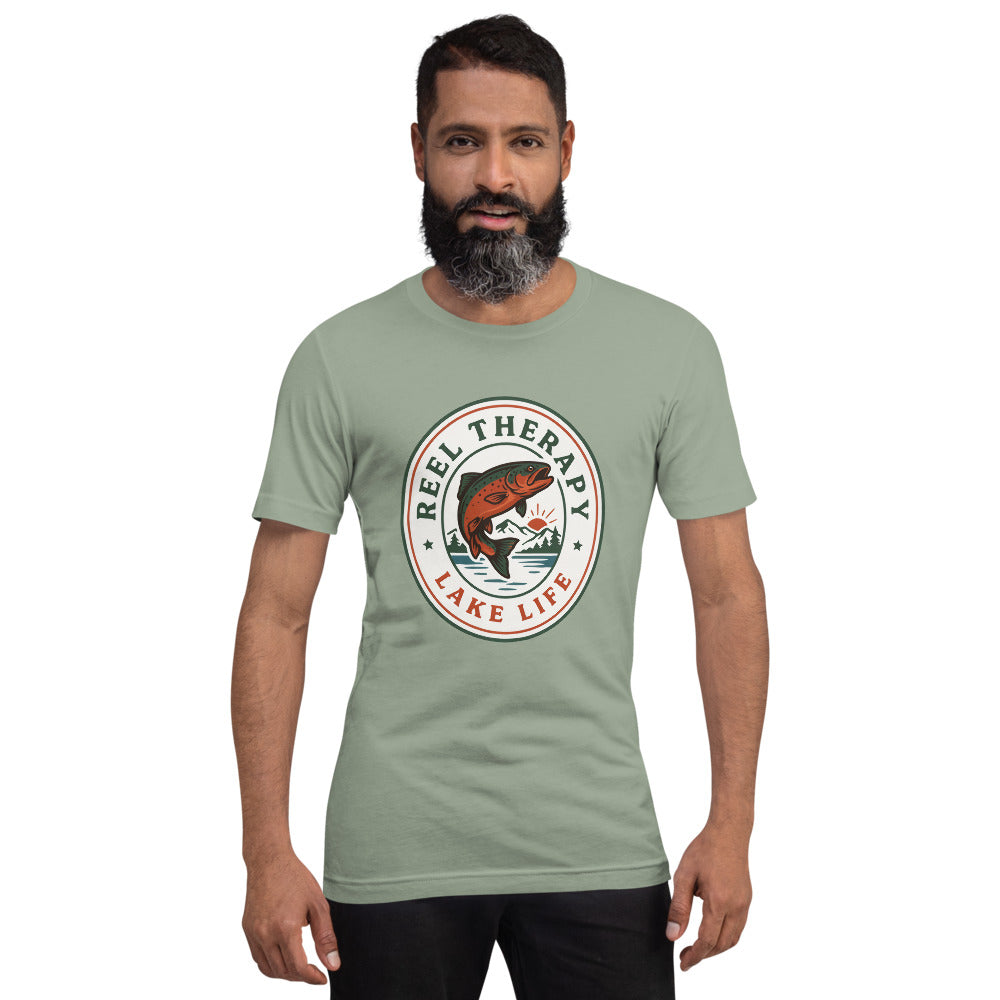 Reel Therapy retro national-park trout badge fishing tee — Sage, on model