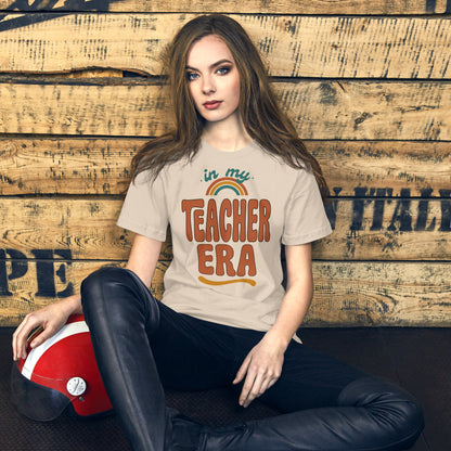 In My Teacher Era retro groovy teacher tee — Soft Cream, on model