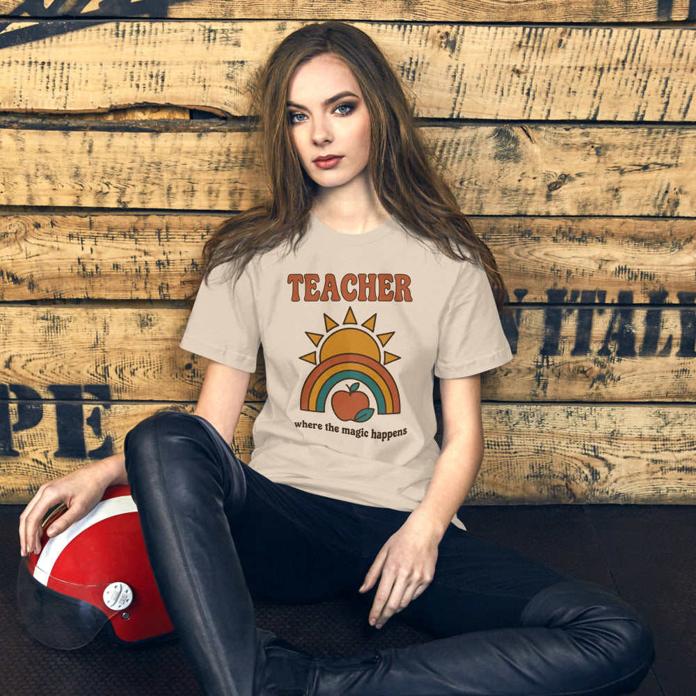 Teacher Where The Magic Happens retro groovy teacher tee — Soft Cream, on model