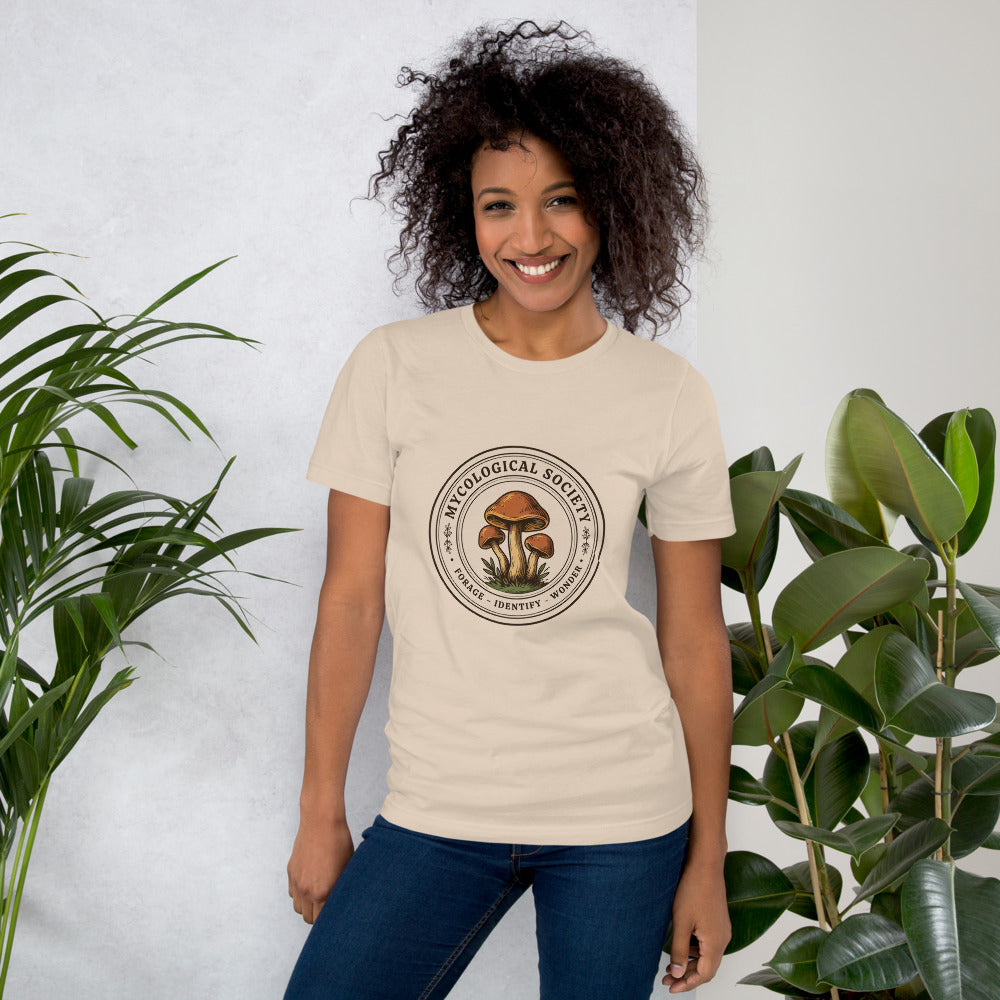 Mushroom Foraging Mycological Society vintage botanical tee — Soft Cream, on model