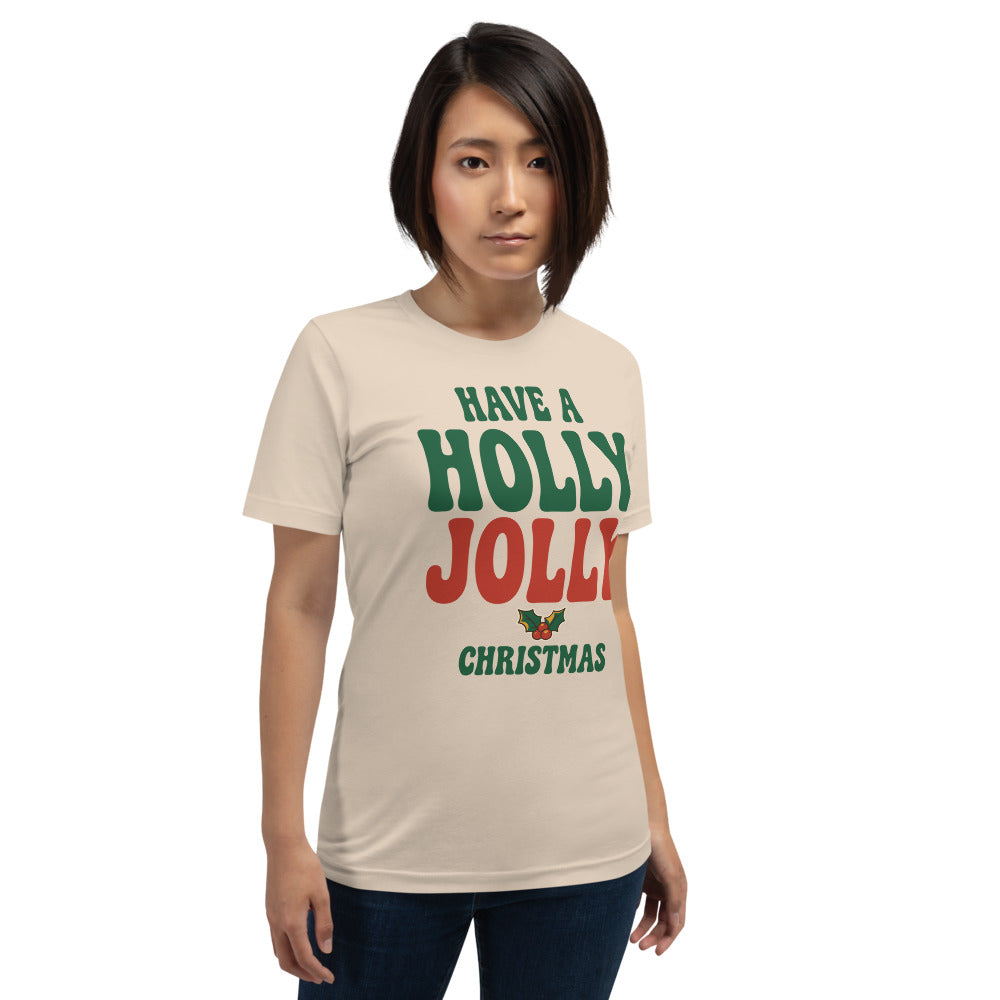 Groovy Holly Jolly retro Christmas tee — Soft Cream, on model