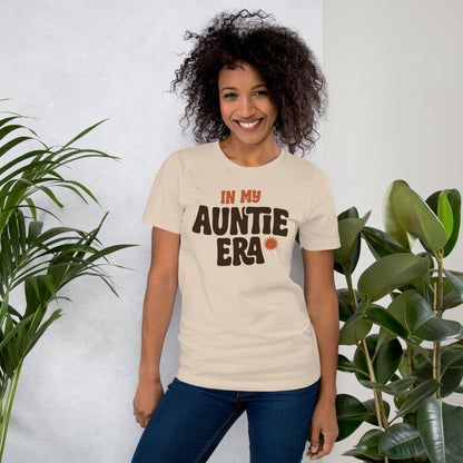 In My Auntie Era retro groovy aunt tee — Soft Cream, on model