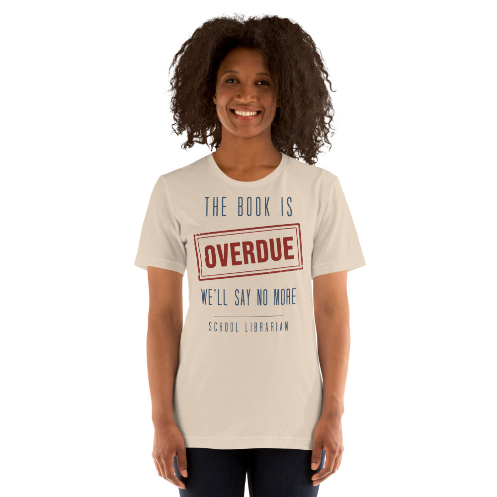 The Book Is Overdue funny school librarian t-shirt — Soft Cream, on model