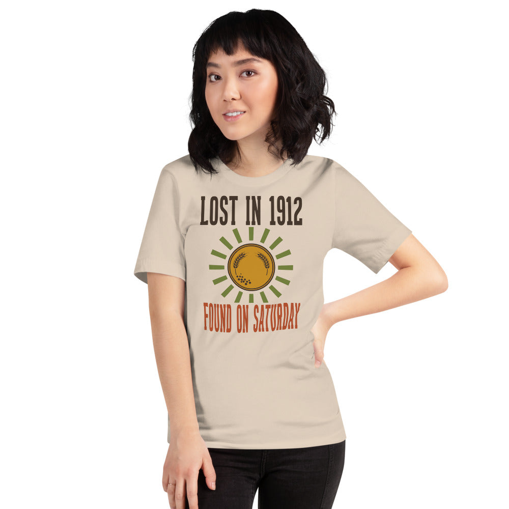 Lost in 1912 Found on Saturday retro metal detecting tee — Soft Cream, on model