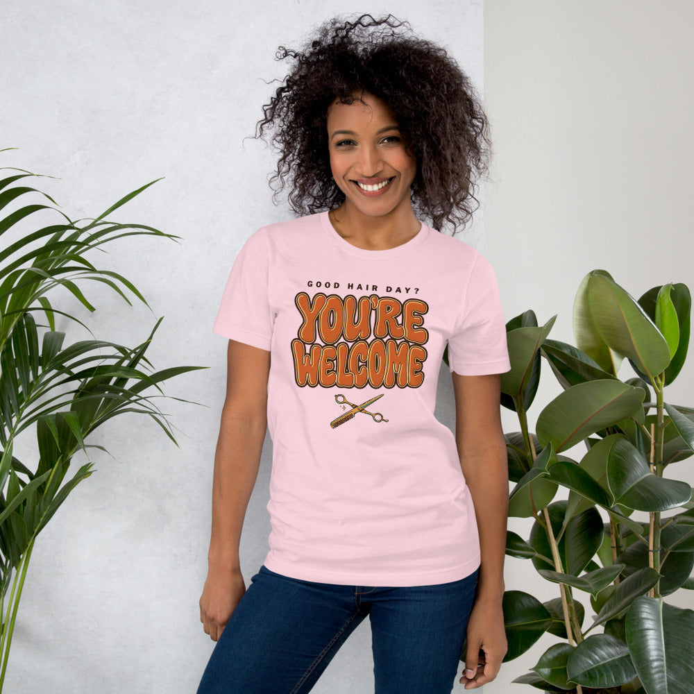 Funny hairstylist Good Hair Day You're Welcome tee — Soft Pink, on model