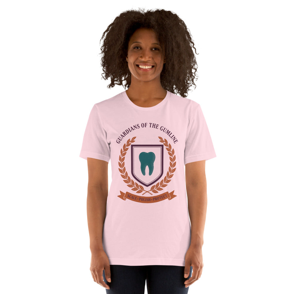 Guardians of the Gumline dental hygienist tee — Soft Pink, on model