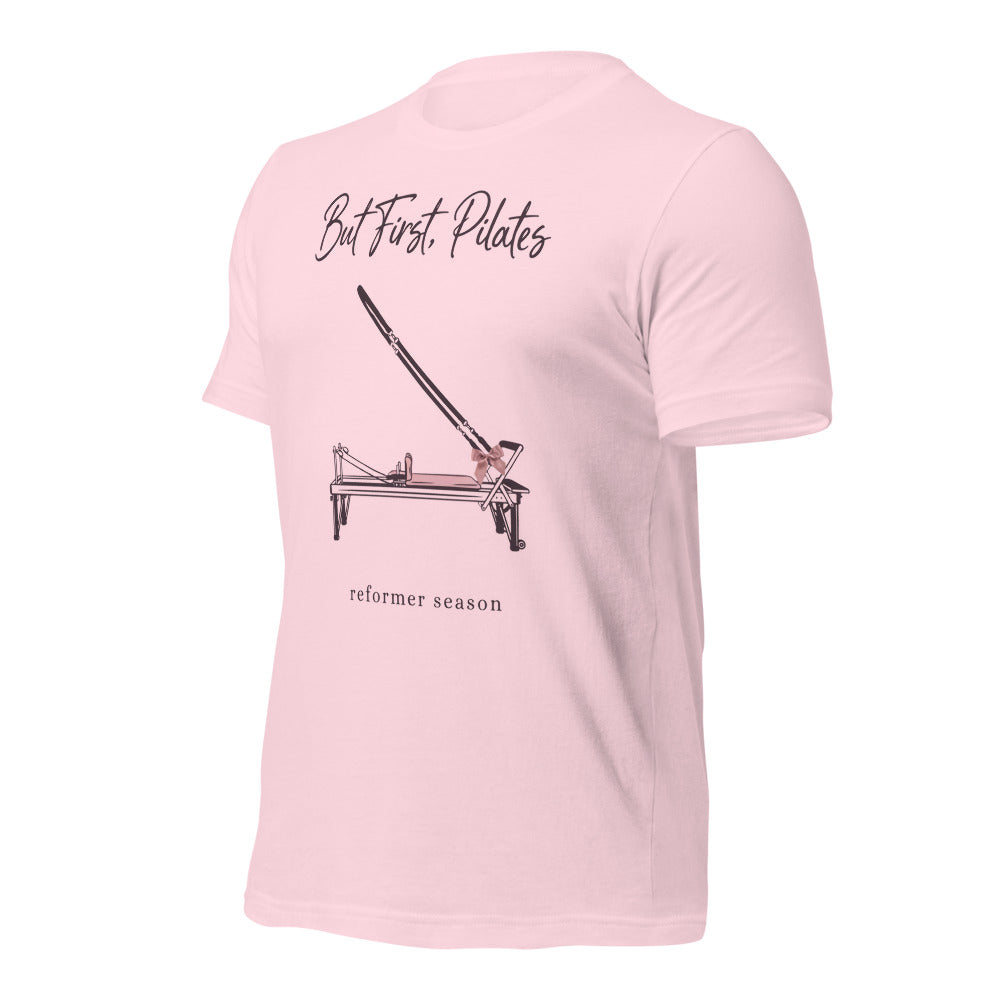 But First Pilates reformer line-art tee — Soft Pink, front-right