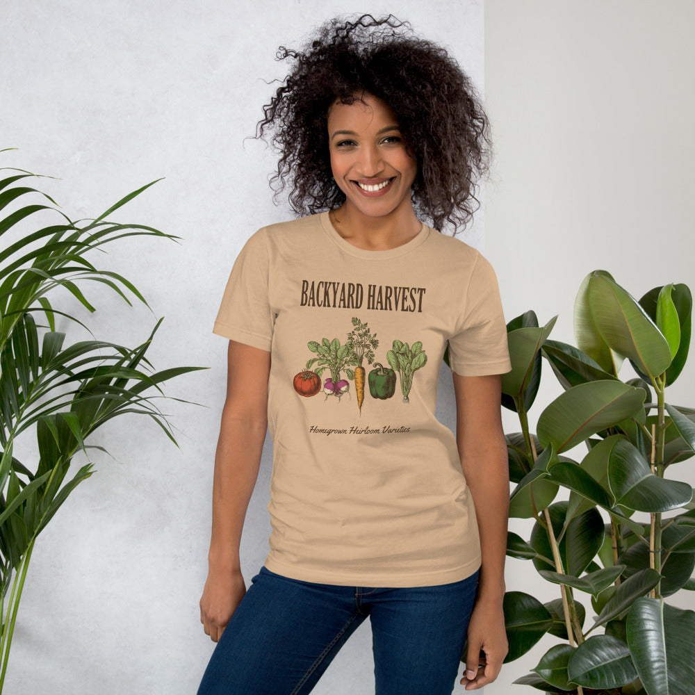 Backyard Harvest heirloom vegetable gardening tee — Tan, on model