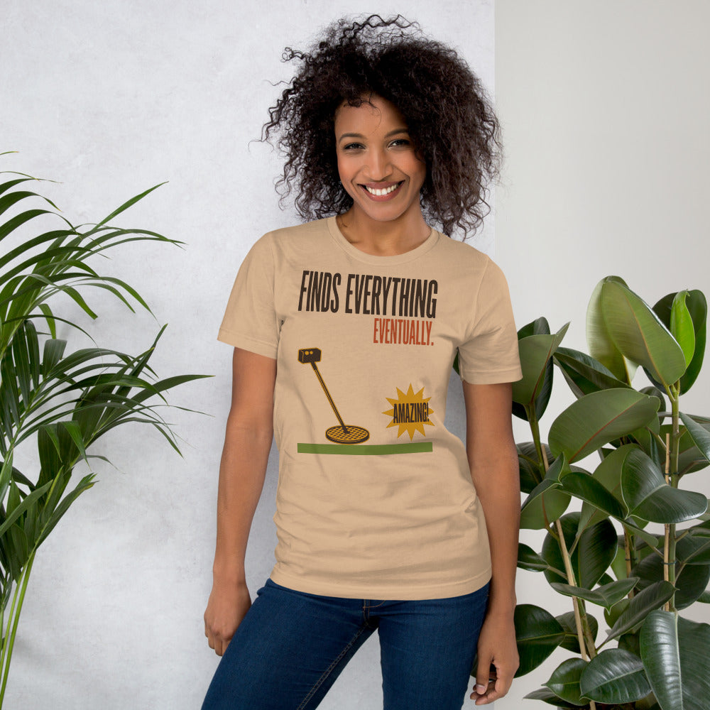 Finds Everything Eventually retro metal detecting tee — Tan, on model