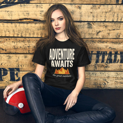 Adventure Awaits retro outdoors typography tee — Vintage Black, on model