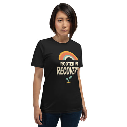 Rooted in Recovery retro rainbow tee — Vintage Black, on model